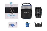 SIRUI AURORA Series 35mm F1.4 Full-frame Autofocus Lens with packaging and accessories displayed.
